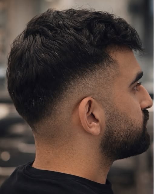 Detailed side view of a blended fade haircut